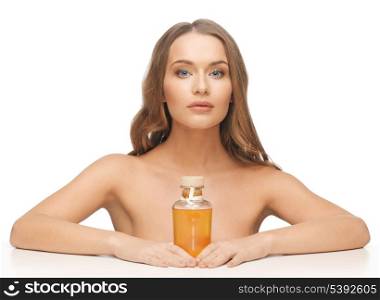 picture of beautiful woman with oil bottle