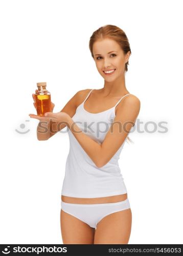 picture of beautiful woman with oil bottle.