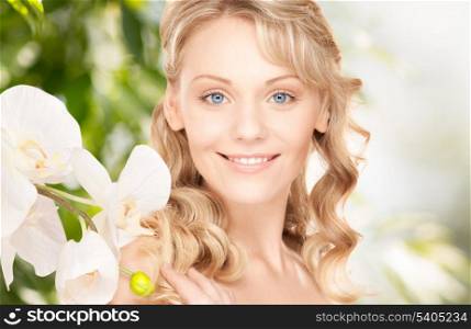 picture of beautiful woman with orchid flower