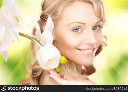 picture of beautiful woman with orchid flower