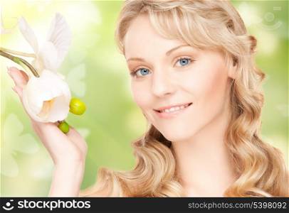 picture of beautiful woman with orchid flower and butterflies