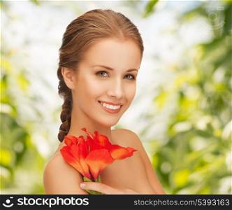 picture of beautiful woman with red lily flower