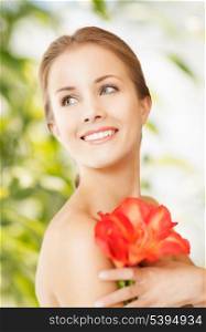picture of beautiful woman with red lily flower