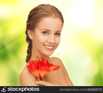 picture of beautiful woman with red lily flower