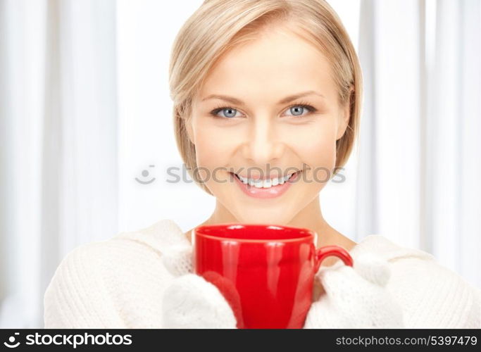 picture of beautiful woman with red mug