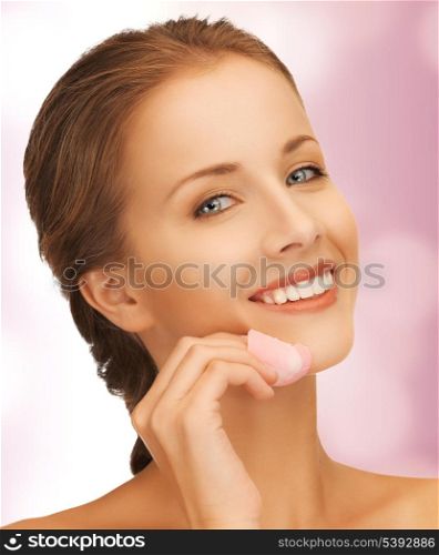 picture of beautiful woman with rose petal