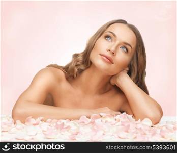 picture of beautiful woman with rose petals