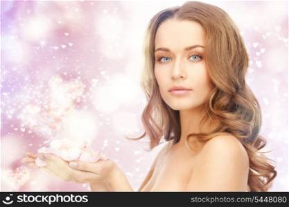 picture of beautiful woman with rose petals and hearts.