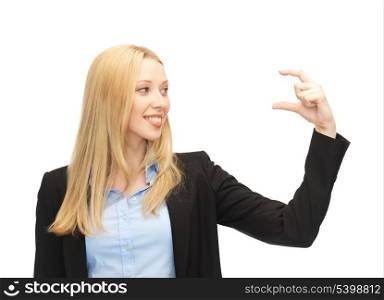 picture of beautiful young businesswoman holding something imaginary