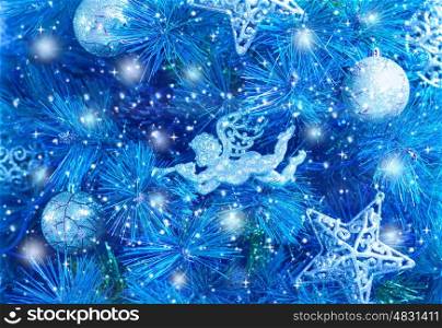 Picture of blue Christmas tree background, Christmastime fir decorations, star, bauble and angel decorated holiday spruce, happy New Year greeting card, xmas celebration, abstract wallpaper