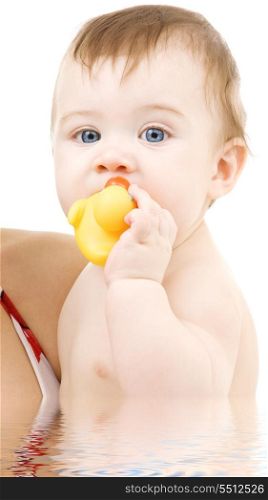 picture of blue-eyed baby boy with rubber duck