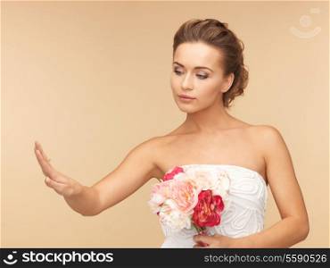 picture of bride looking at wedding or engagement ring