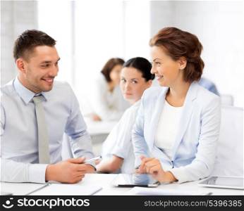 picture of business colleagues talking in office