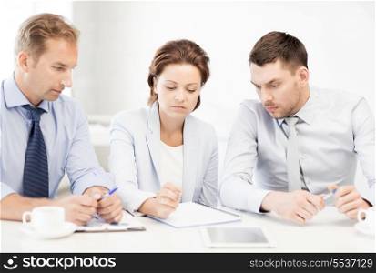picture of business team discussing something in office