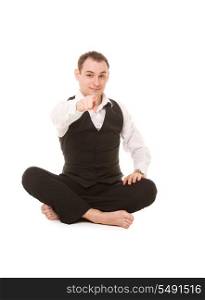 picture of businessman sitting in lotus pose