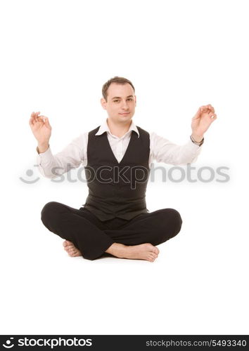 picture of businessman sitting in lotus pose