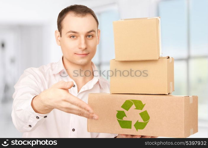 picture of businessman with parcels in office