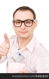 picture of businessman with piggy bank and money