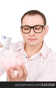 picture of businessman with piggy bank and money