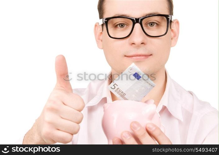 picture of businessman with piggy bank and money