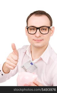 picture of businessman with piggy bank and money