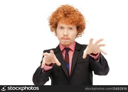 picture of businessman working with something imaginary