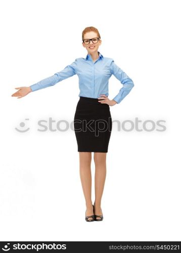 picture of businesswoman pointing her hand in specs