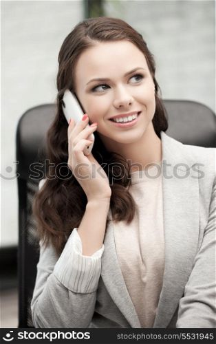 picture of businesswoman with cell phone calling or talking