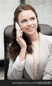 picture of businesswoman with cell phone calling or talking