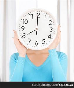 picture of businesswoman with clock over her face