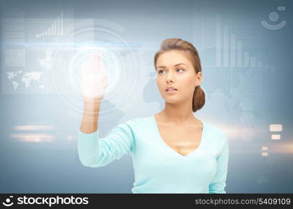 picture of businesswoman working with something imaginary