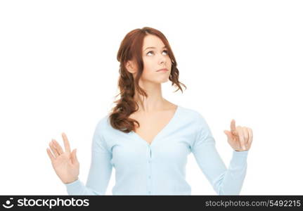 picture of businesswoman working with something imaginary