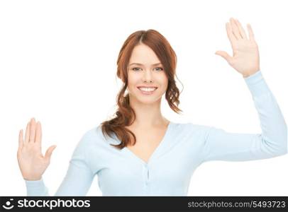 picture of businesswoman working with something imaginary