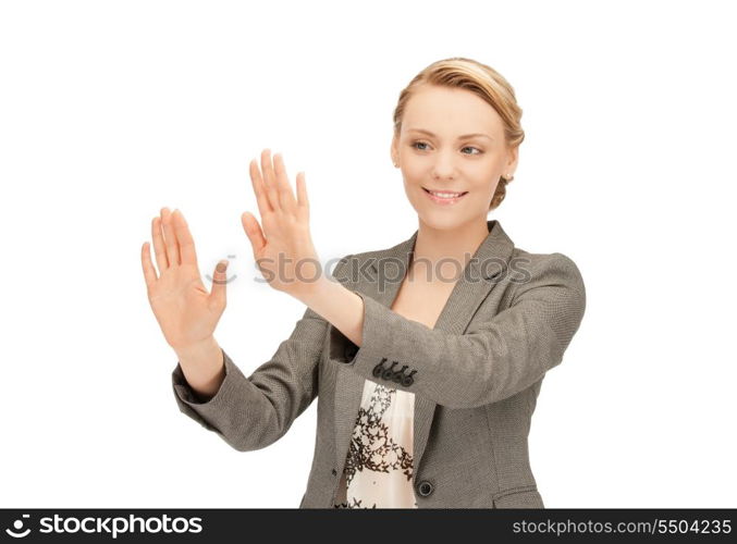 picture of businesswoman working with something imaginary