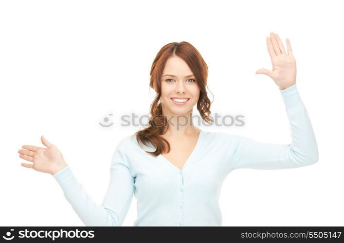 picture of businesswoman working with something imaginary