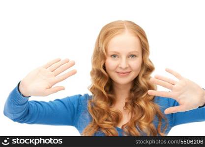 picture of businesswoman working with something imaginary