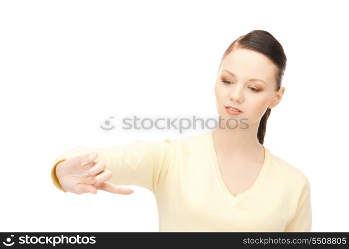 picture of businesswoman working with something imaginary