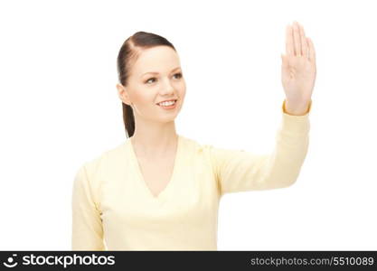 picture of businesswoman working with something imaginary