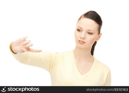 picture of businesswoman working with something imaginary