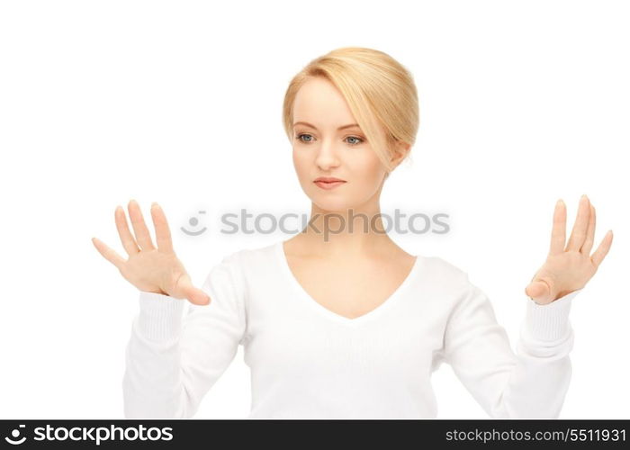 picture of businesswoman working with something imaginary