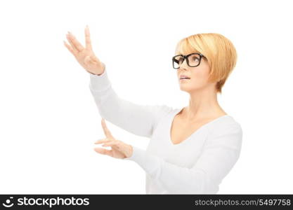 picture of businesswoman working with something imaginary&#xA;