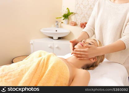 picture of calm beautiful woman in massage salon