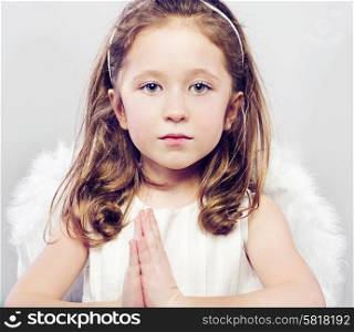 Picture of calm little girl with serious look