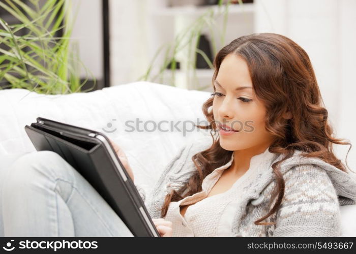 picture of calm woman with tablet pc computer