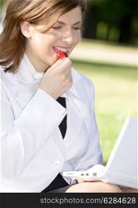 picture of chatting business lady with strawberry