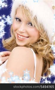 picture of cheerful santa helper girl over blue