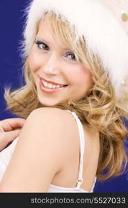 picture of cheerful santa helper girl over blue