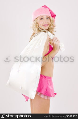 picture of cheerful santa helper girl with big bag