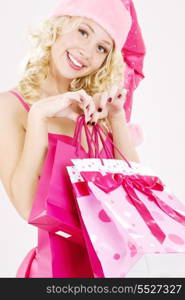 picture of cheerful santa helper girl with shopping bags