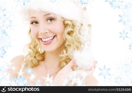 picture of cheerful santa helper girl with snowflakes